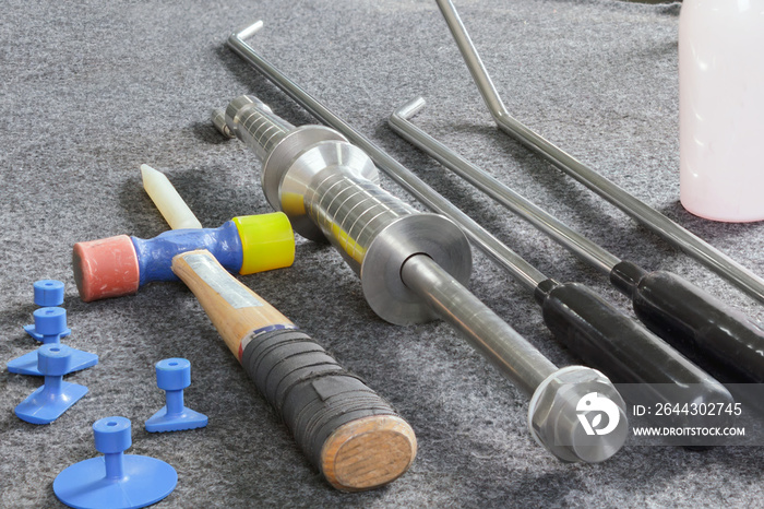 Paintless Dent Repair Kit Tools Set On The Work Table.