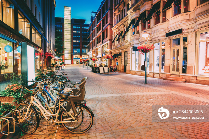 Helsinki, Finland. Bicycles Parked Near Storefronts In Kluuvikatu Street