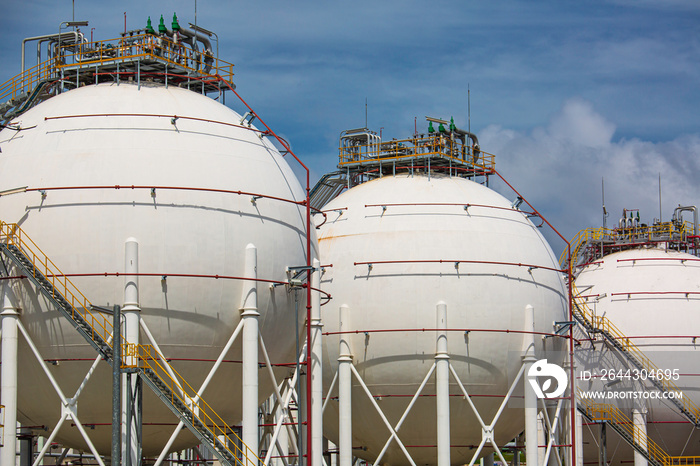 White spherical propane tanks.