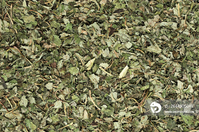 Dried Melissa leaves (Melissa officinalis), also known as lemon balm. Melissa is used as an herb, in teas and also as flavouring. Close up, top view