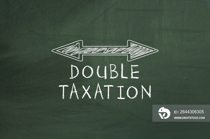 Double arrowed line showing Double taxation concept on chalkboard.