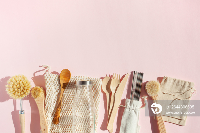 zero waste eco friendly cleaning kitchen concept. wooden brushes, drinking straw, cotton bags