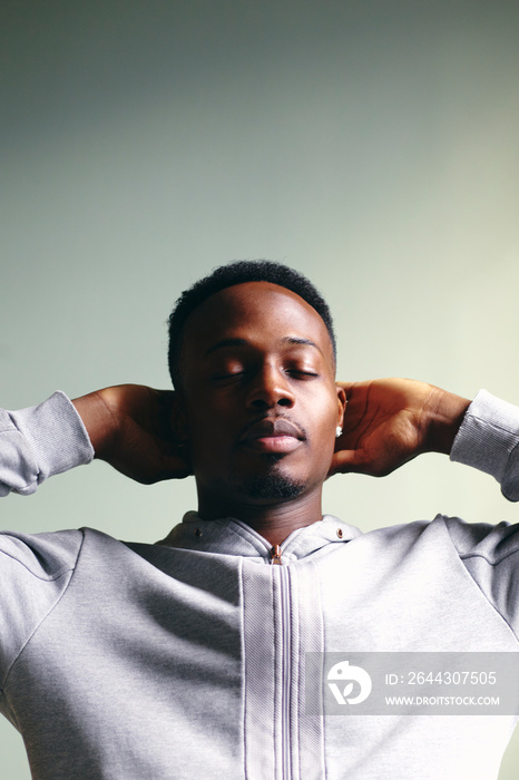 Portrait of mid adult man in sweatshirt