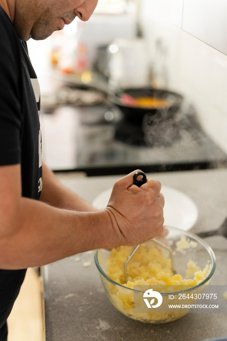 Man preparing food in kitchen