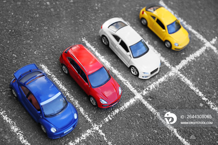 Close up of toy cars parking