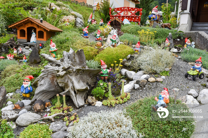 Garden gnomes in a garden of a house at Engelberg