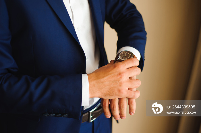 businessman looking at his watch