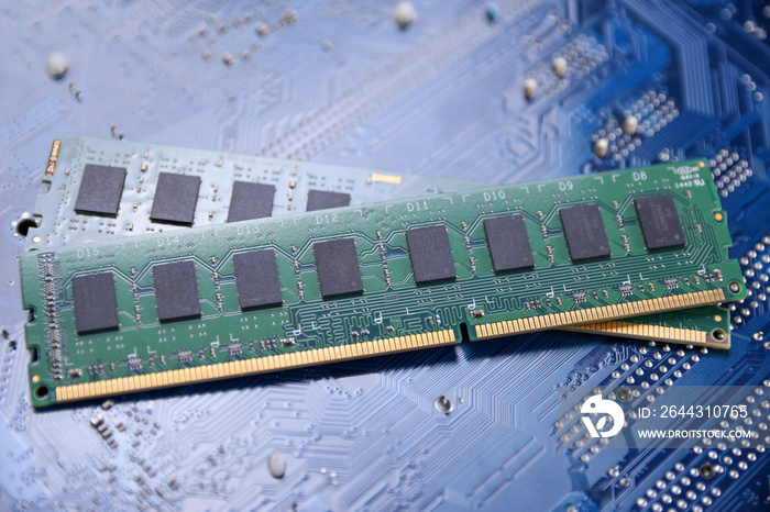 Computer memory RAM on motherboard background . Close up. system, main memory, random access memory, onboard, computer detail. Computer components . DDR3. DDR4. DDR5