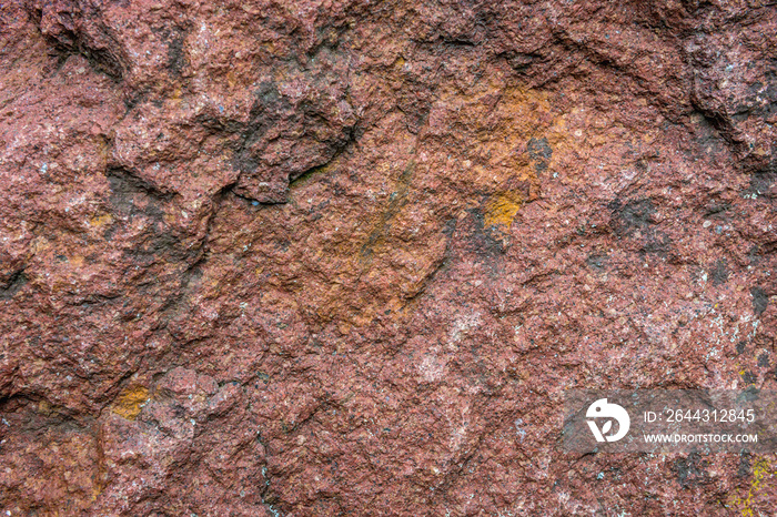 Details of texture of Baltic red porphyry rock in Poland