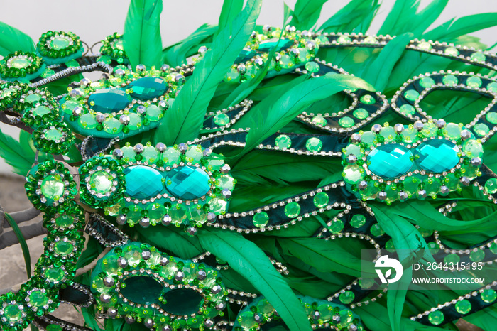 Detail of the helmet with feathers and embroidery for the carnival