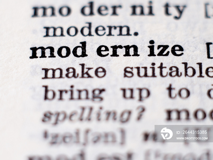 Dictionary definition of word modernize. Selective focus.