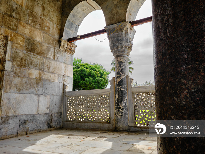 Bursa, Turkey. Green mosque (yesil camii) in Nicaea (iznik) entrance gate and arabic and islamic details above the gate engraving with many architectural details on marble stones.