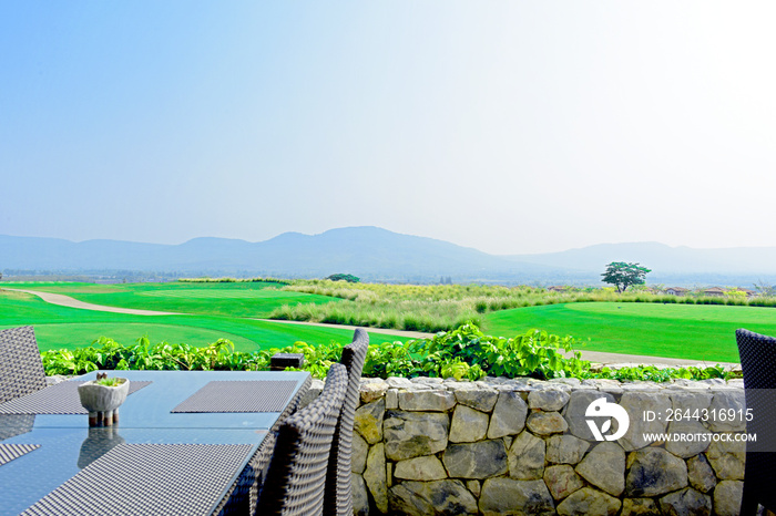 Dining table with view of golf course greens ,cozy and relaxation