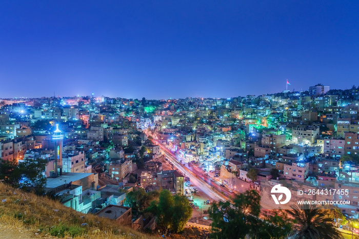 Cityscape Amman downtown at dusk, Panoramic view from the citadel hill. Capital of Jordan.