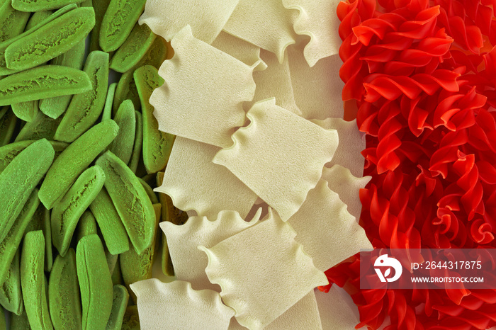 Dried pasta in Italian flag colors. Top view