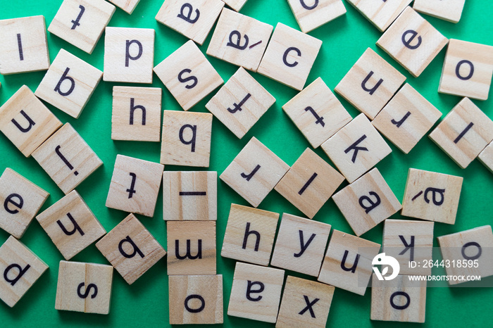 Alphabet letters on wooden scrabble pieces