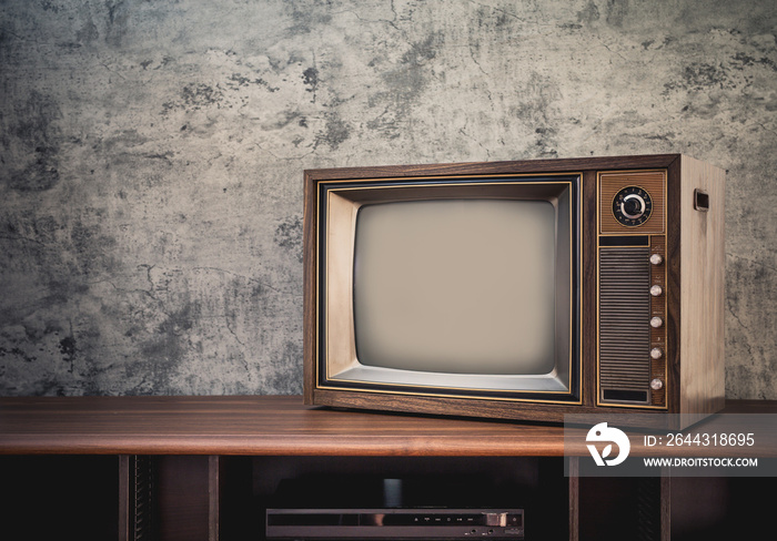 Old television on table