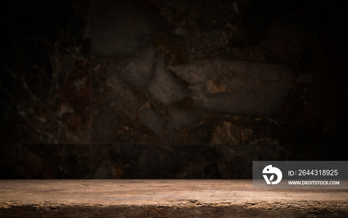 Old wooden table with brick background dark