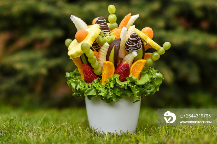 Fresh fruit bucket basket healthy lifestyle present with chocolate