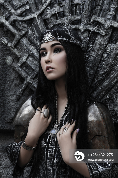 lovely brunette woman in a black and silver dress and armor, tears makeup, crown, fantasy hero, north legend