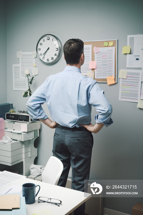 Office worker checking notes