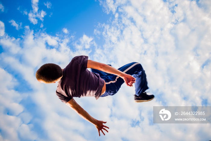 Free runner make parkour in the air