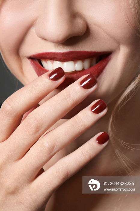 Fashionable young woman with beautiful manicure, closeup