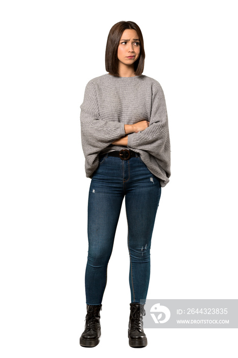 A full-length shot of a Young woman feeling upset over isolated white background