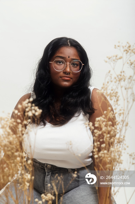 South Asian female solo lifestyle studio portrait shot