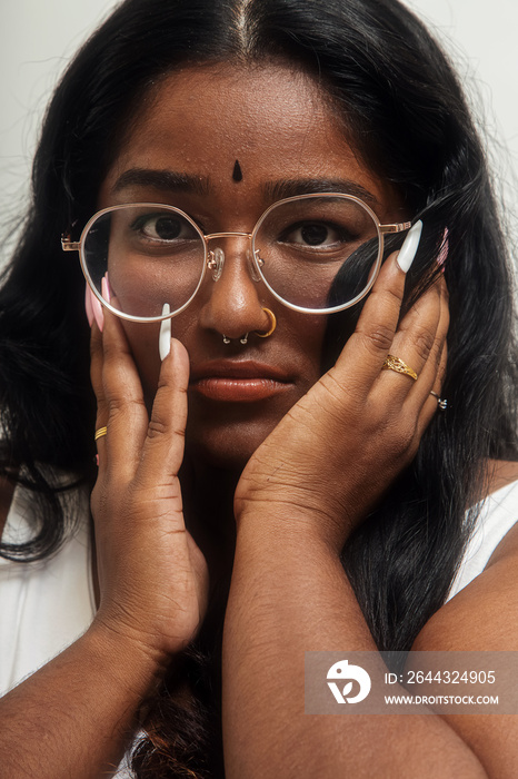 South Asian female solo lifestyle studio portrait shot