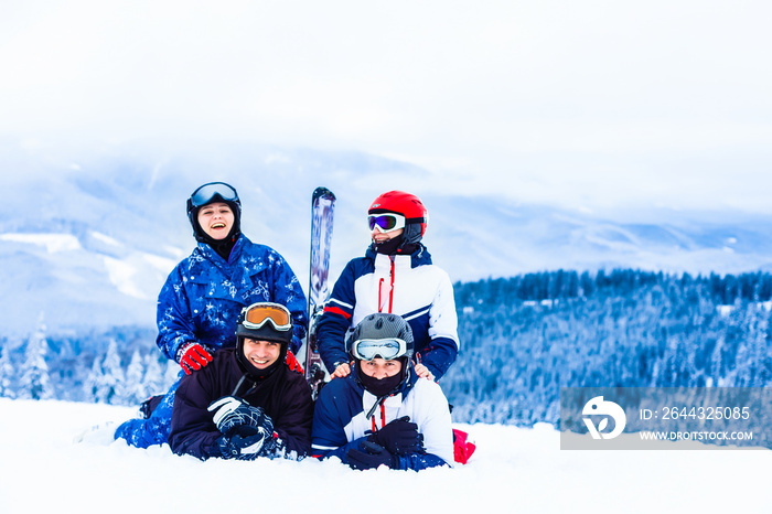 Group of friends with ski walking at a ski resort