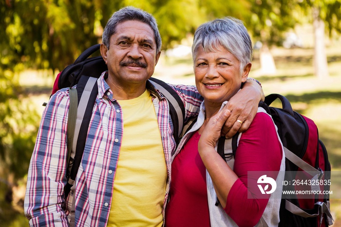 Portrait of hiker couple embracing