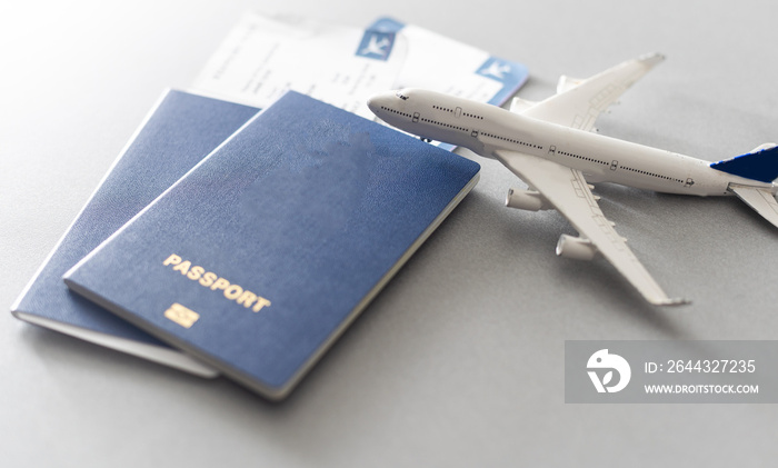 Airline tickets and documents on wooden table, top view