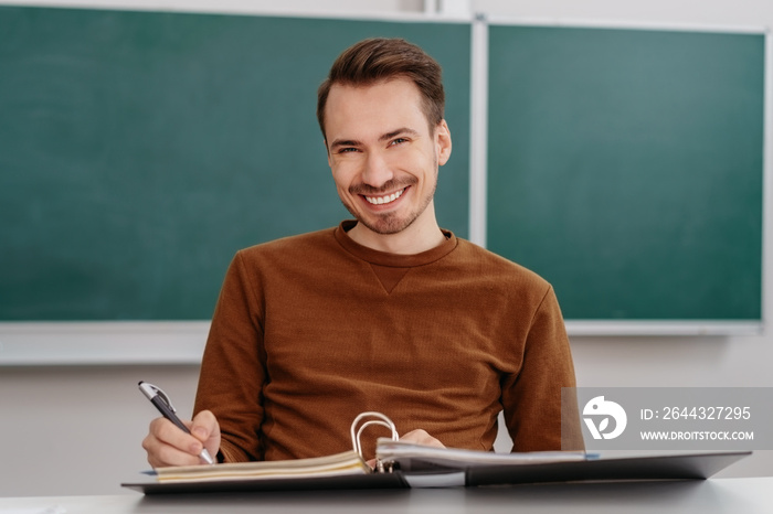 Happy male student with a confident smile