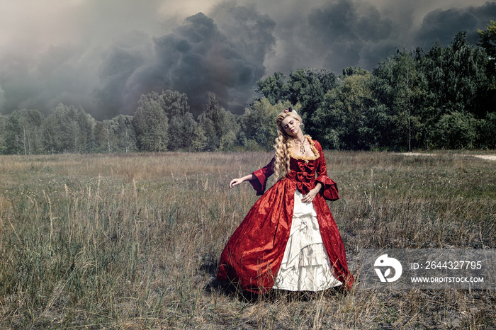 Blonde woman with long curly hair with flower accessory in antique red dress