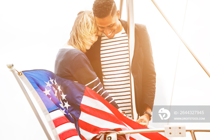 Young couple relaxing on yacht