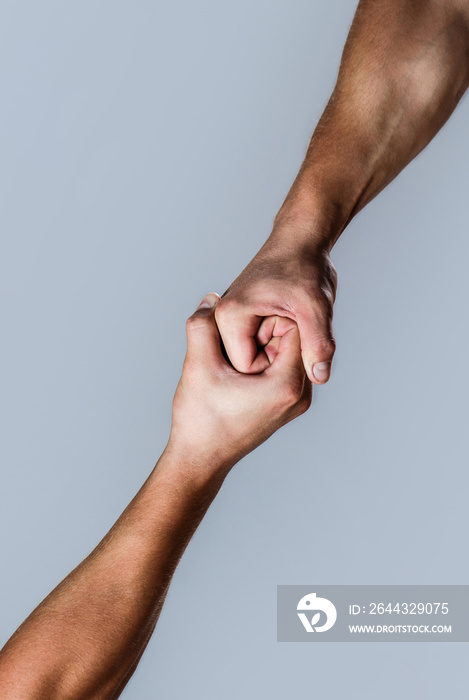 Two hands, isolated arm, helping hand of a friend. Friendly handshake, friends greeting. Rescue, helping hand. Male hand united in handshake. Man help hands, guardianship, protection.