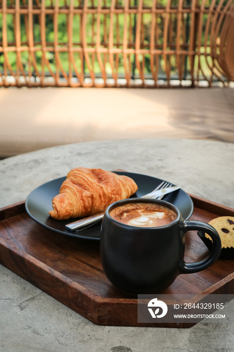 A cup of coffee with latte art on top