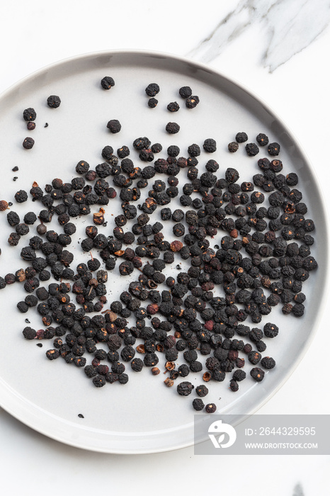 Dried Tasmanian peppercorns on plate