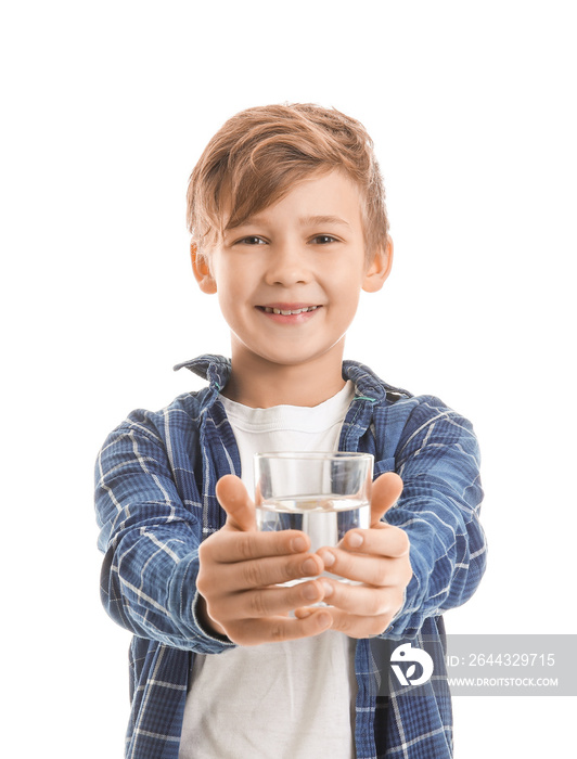 Cute little boy with glass of water on white background