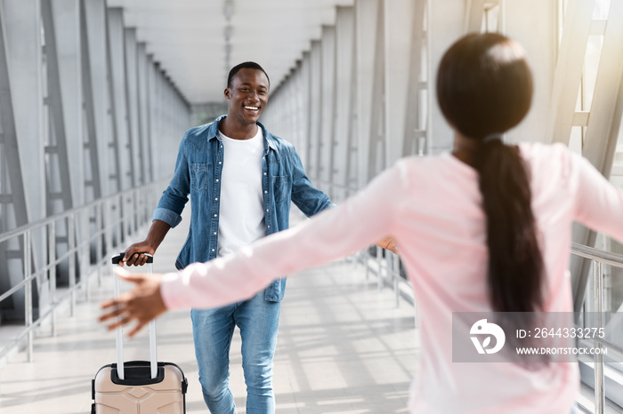 Unrecognizable Black Woman Meeting Her Boyfriend In Airport After His Arrival