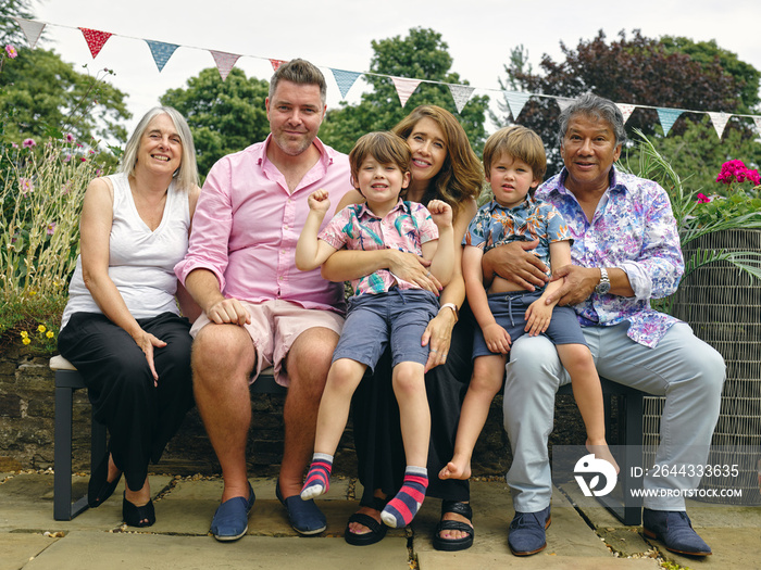 Portrait of three-generation family with children