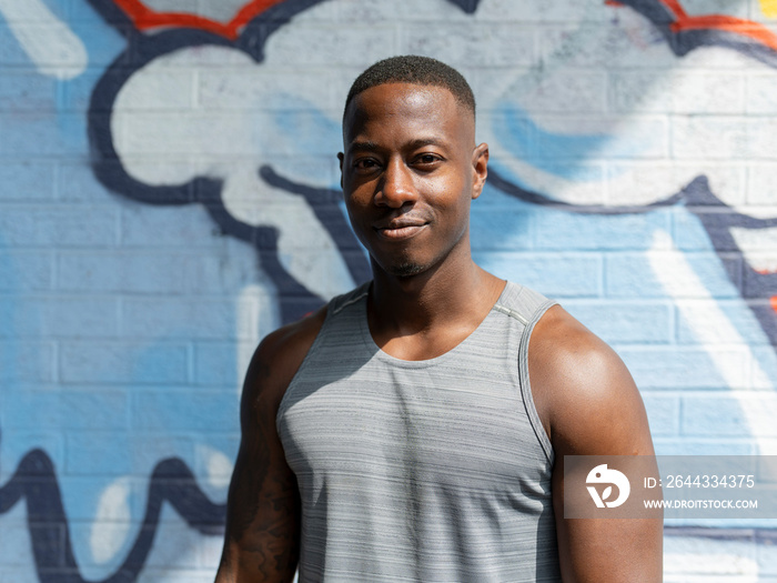 Portrait of muscular man in sports clothing