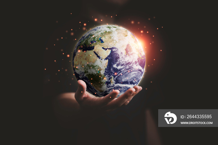 Man holding planet by hand for earth day and saving energy environment concept ,Element of this image from NASA and 3d render.