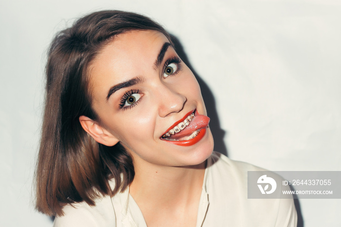 Young woman portrait with dental braces natural