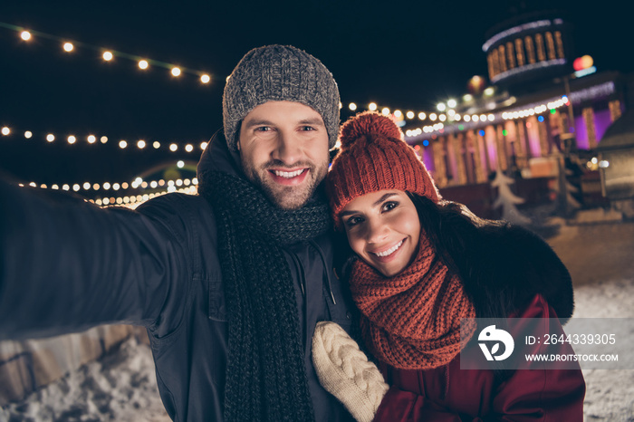 Self-portrait of his he her she nice attractive charming lovely cheerful cheery sweet couple wearing warm outfit spending December winter vacation honey moon exploring the world outdoor