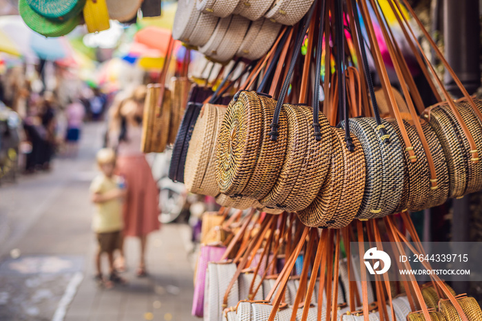 Famous Balinese rattan eco bags in a local souvenir market in Bali, Indonesia