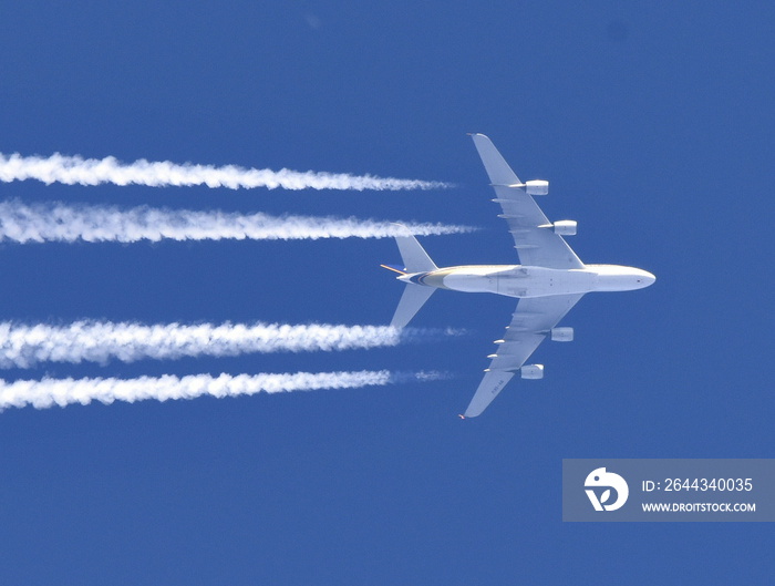 Airplane in the blue sky.