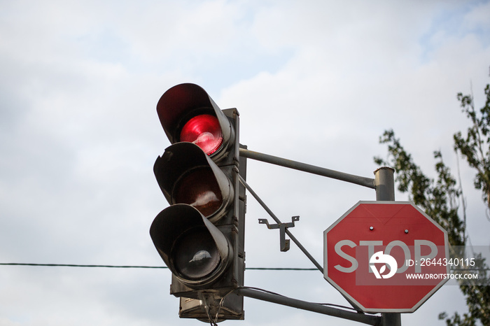 traffic light the three colors, with red stop sign