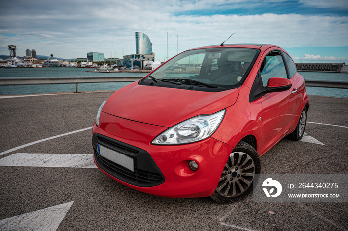 Small red Ford Ka brand city utility car